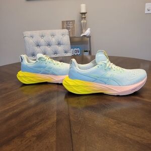 ASICS Women's Novablast 4 paris Athletic Shoes - Light Blue and Yellow